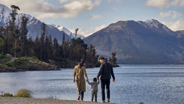 Family on the shores of Lake Wakatipu, Walter Peak High Country 