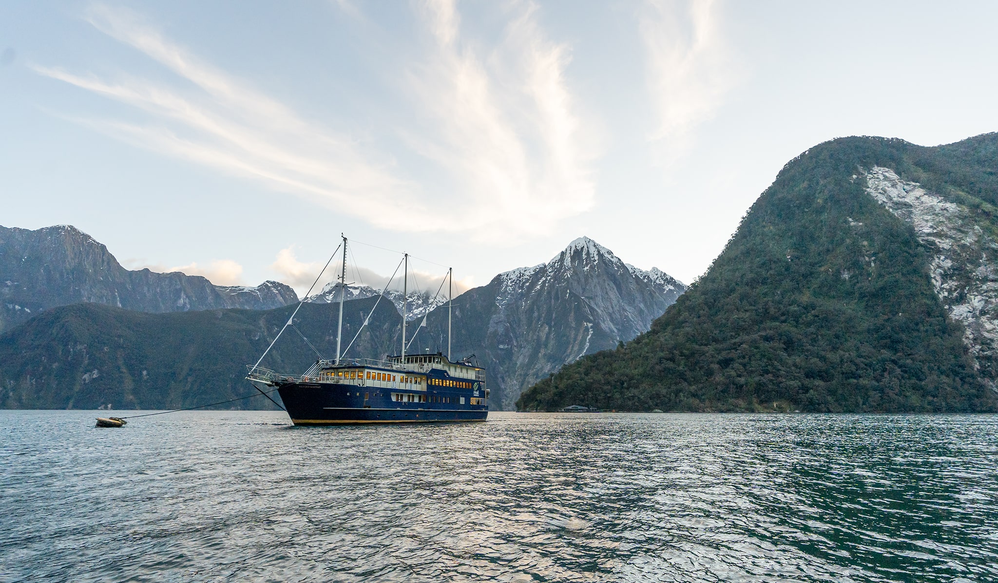Boat moored in Milford Sound for the night